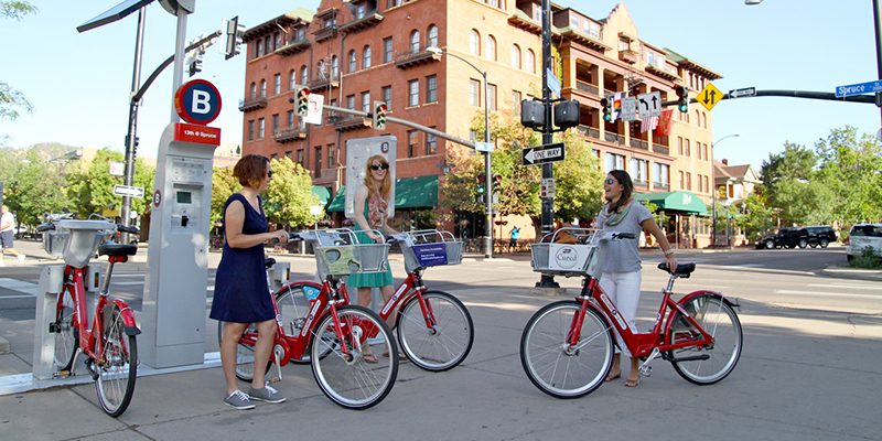3 women using Boulder B-Cycles