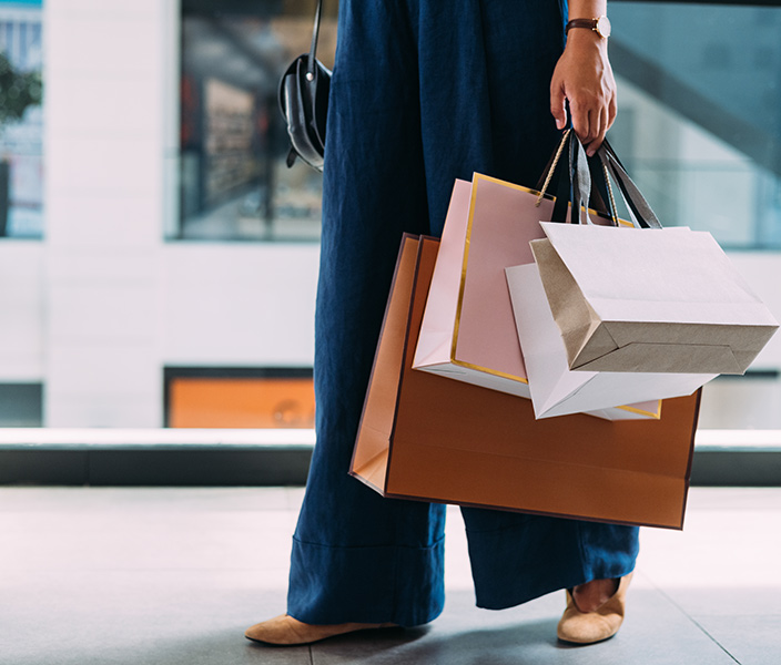 A woman holding shopping bags